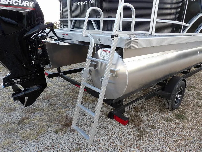 Slide: The Image of 2025 Bennington 21 SL pontoon boat with ladder and Mercury engine. - 46