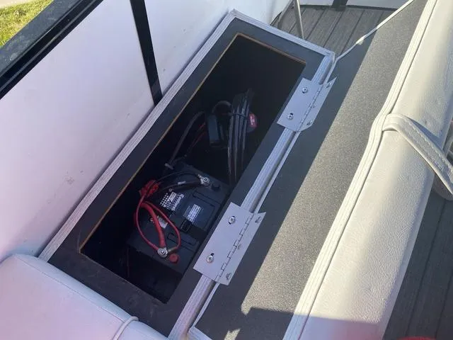 Slide: The Image of Boat battery compartment in a 2022 G3 SL model, featuring secure wiring and seating. - 10