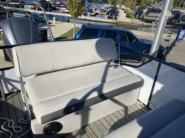 Slide: The Image of Luxury boat seating on a G3 SL 2022 model at a marina. - 15