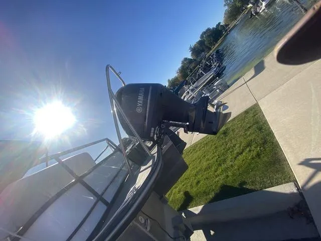 Slide: The Image of Boat with Yamaha motor by lakeside, sunny day, G3 SL 2022 model. - 3