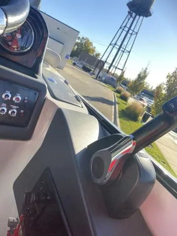 Slide: The Image of Boat dashboard with controls, G3 SL 2022 model, outdoor setting with water tower. - 7