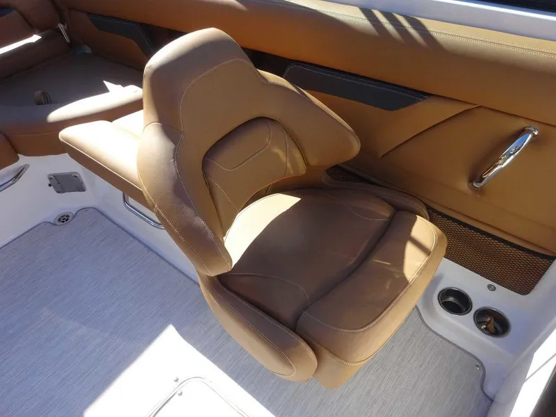 Slide: The Image of 2025 Four Winns HD 5 Sterndrive boat seat, brown leather, luxurious interior design. - 11