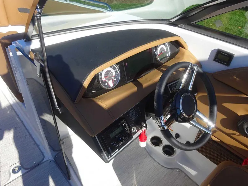 Slide: The Image of 2025 Four Winns HD 5 Sterndrive dashboard with modern steering and instrument panel. - 14