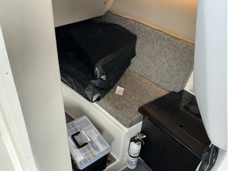 Slide: The Image of 2025 Cobalt R33 Surf boat with reflective "Surf" logo detail. - 14