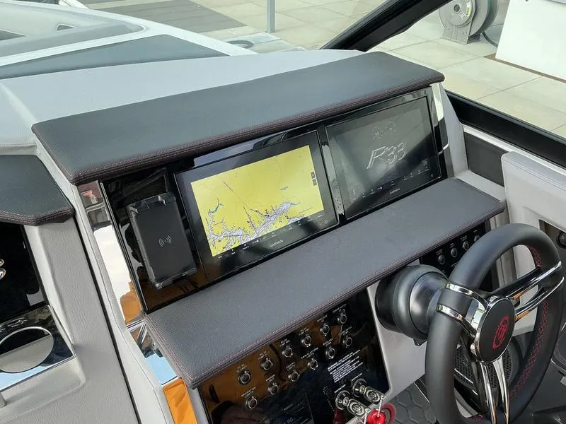 Slide: The Image of Interior of 2025 Cobalt R33 Surf boat with sleek design and modern features. - 18