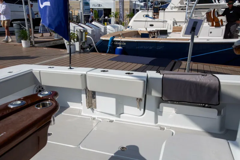 Slide: The Image of Freeman 47 boat interior at dock, showcasing modern design, 2023 model. - 17