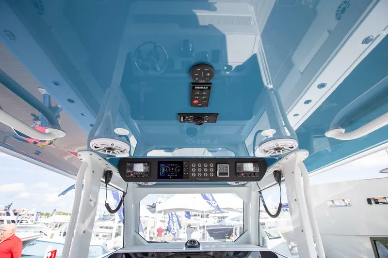 Slide: The Image of 2023 Freeman 47 boat interior with advanced control panel and speakers. - 21