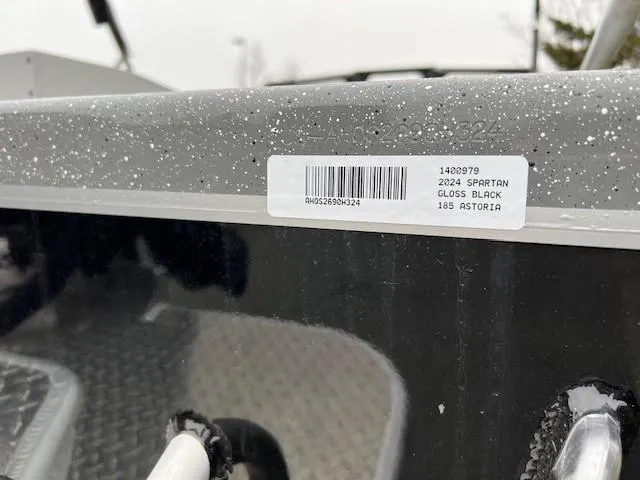 Slide: The Image of 2024 Spartan 185 Astoria boat, gloss black finish, with barcode label. - 9
