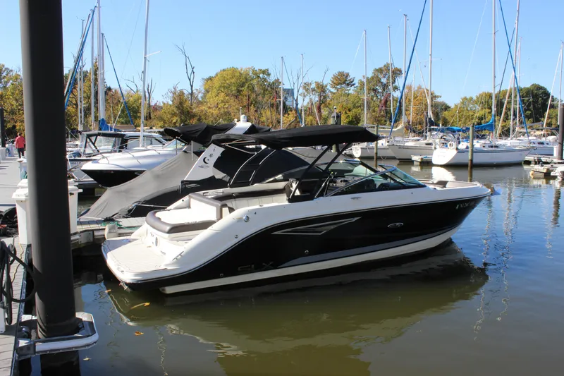 The Image of 2016 Sea Ray 250 SLX boat docked in a marina. - 0
