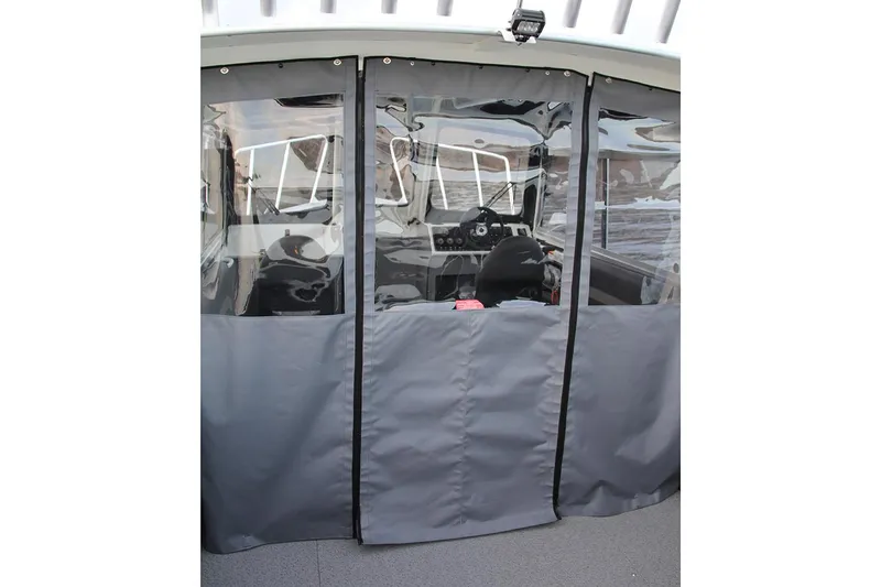 Slide: The Image of 2024 Spartan 220 Maximus interior with steering wheel, dashboard, and seating. - 21