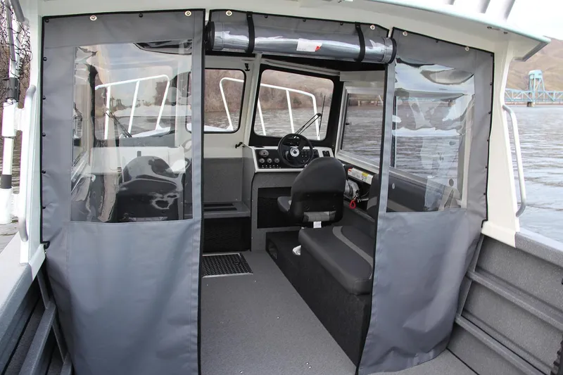 Slide: The Image of 2024 Spartan 220 Maximus interior with gray seating and modern dashboard design. - 22