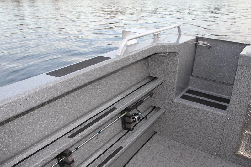 Slide: The Image of Control panel on 2024 Spartan 220 Maximus boat with speckled finish. - 25