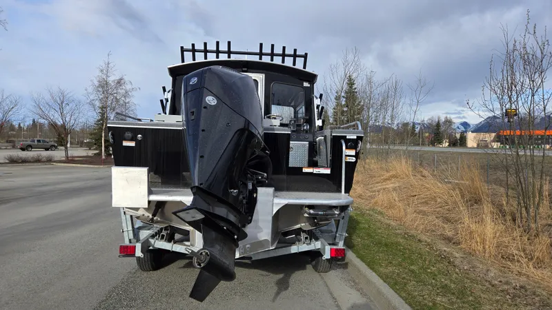 Slide: The Image of 2024 Spartan 220 Maximus boat on trailer outside Bass Pro Shops, Anchorage, Alaska. - 6