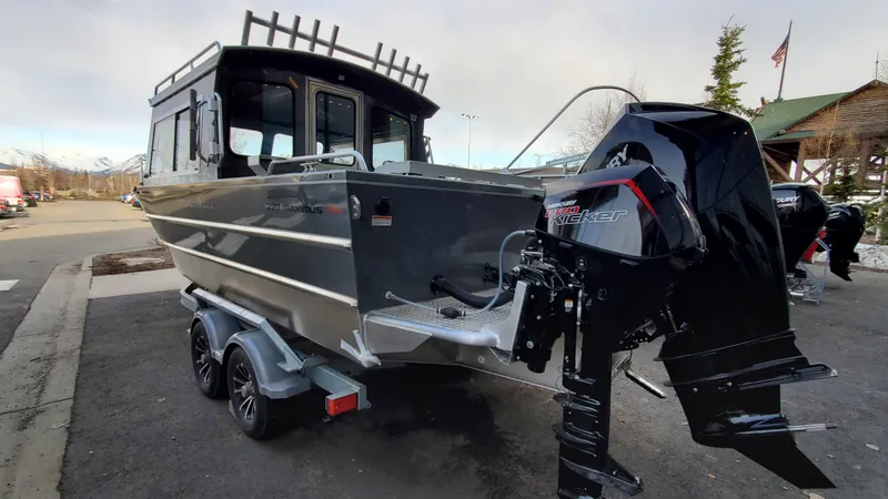 Slide: The Image of 2023 Spartan 220 Maximus boat with powerful outboard motor on trailer. - 5