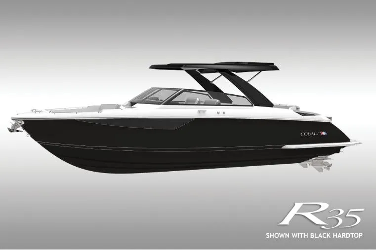 Slide: The Image of 2025 Cobalt R35 boat with black hardtop, sleek design, side view. - 1