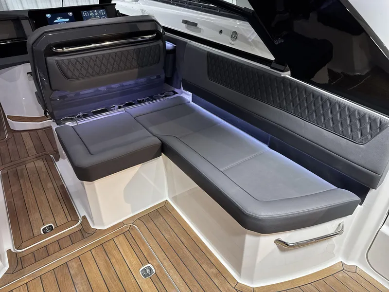 Slide: The Image of Luxurious interior seating of 2025 Cobalt R35 boat with elegant wood flooring. - 11