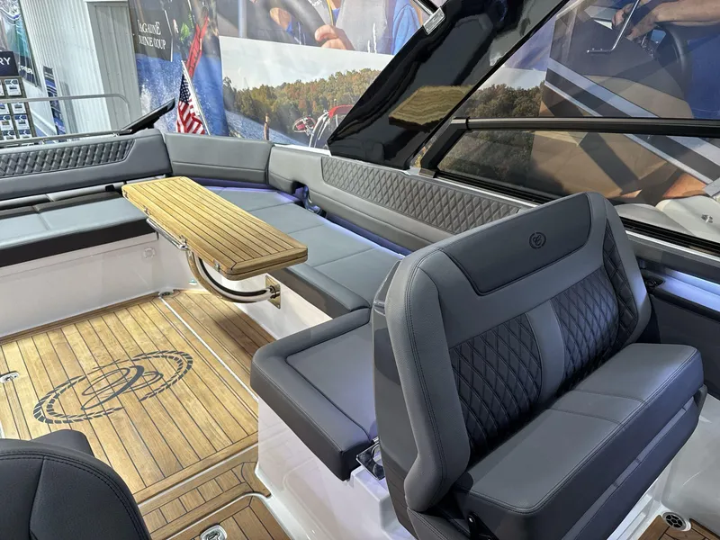 Slide: The Image of Luxurious interior of 2025 Cobalt R35 boat with elegant seating and wooden flooring. - 14