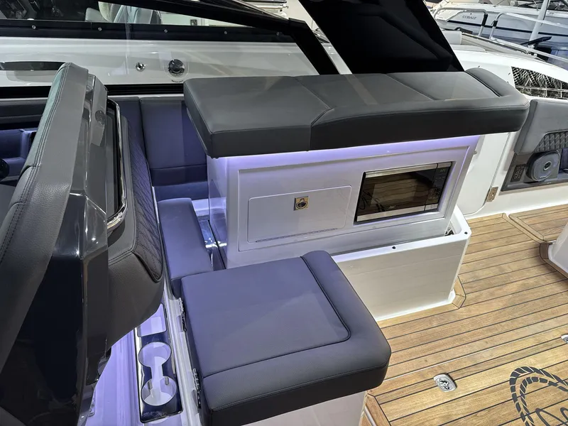 Slide: The Image of Luxurious interior of 2025 Cobalt R35 boat with sleek seating and modern amenities. - 16