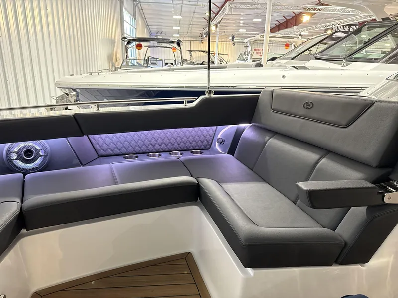 Slide: The Image of Luxurious interior of 2025 Cobalt R35 boat with sleek seating and ambient lighting. - 24
