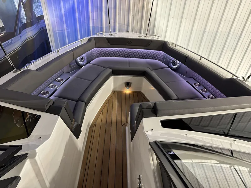 Slide: The Image of Luxurious interior of 2025 Cobalt R35 boat with plush seating and ambient lighting. - 4