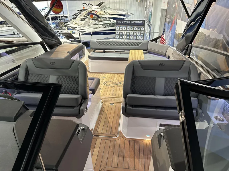 Slide: The Image of Interior of 2025 Cobalt R35 boat with luxurious seating and wood flooring. - 5