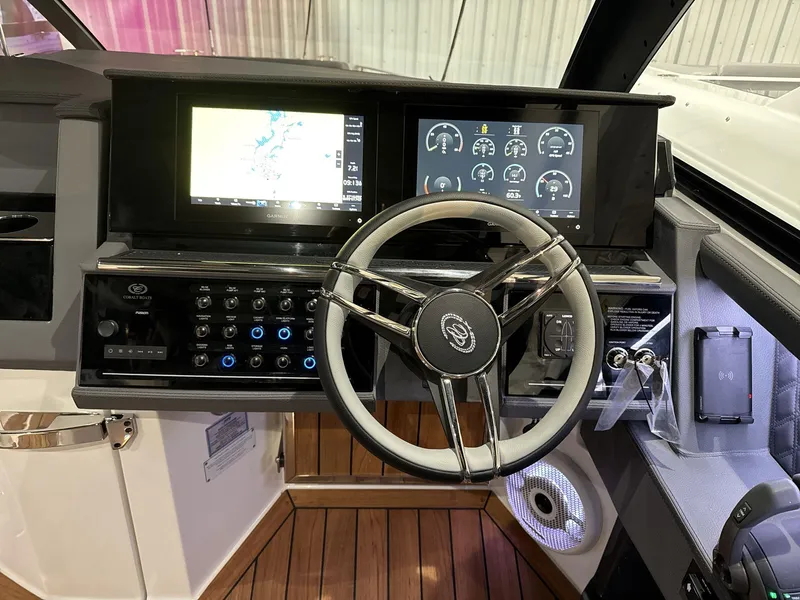 Slide: The Image of 2025 Cobalt R35 boat dashboard with advanced navigation and control systems. - 7