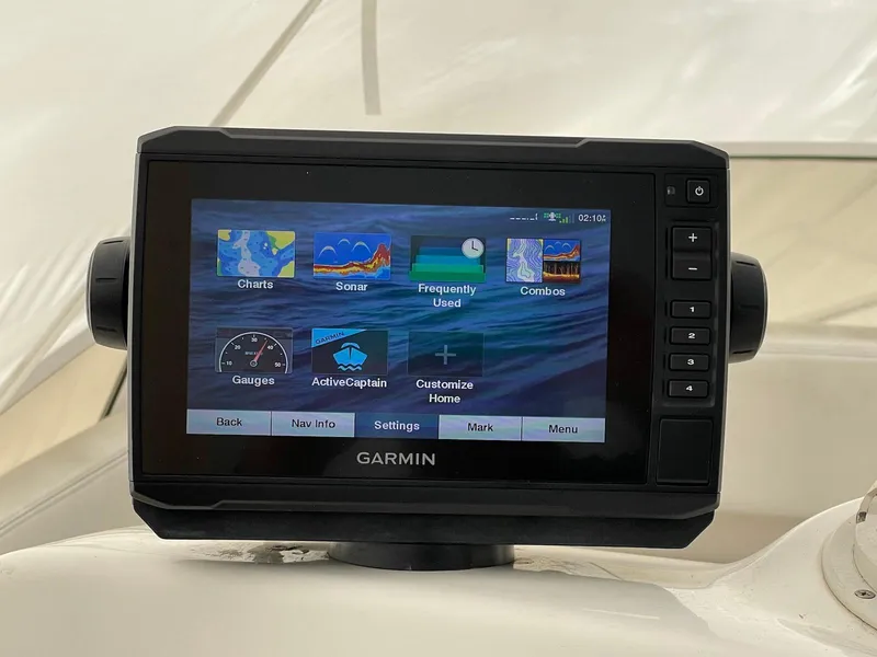 Slide: The Image of Garmin navigation system on 1999 Silverton 351 Sedan Cruiser dashboard. - 10