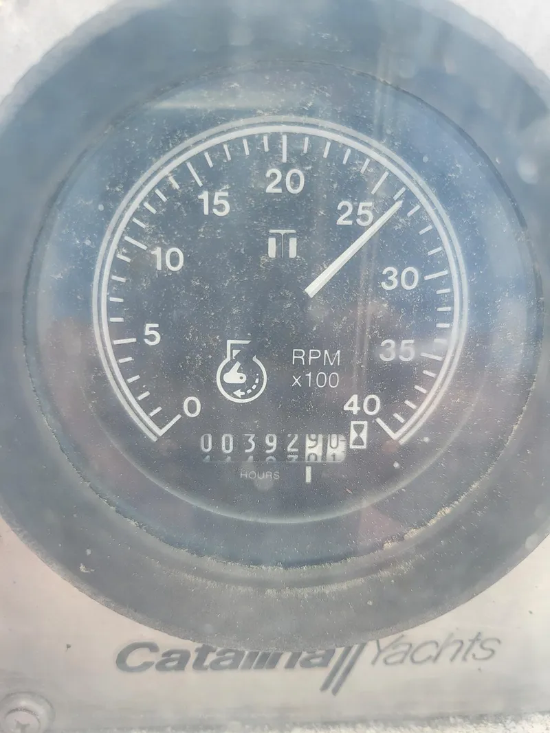 Slide: The Image of 1988 Catalina 30 boat tachometer displaying 392 hours. - 19