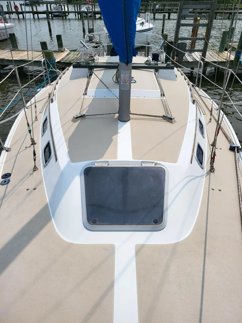 Slide: The Image of Deck of a 1988 Catalina 30 sailboat in harbor. - 2
