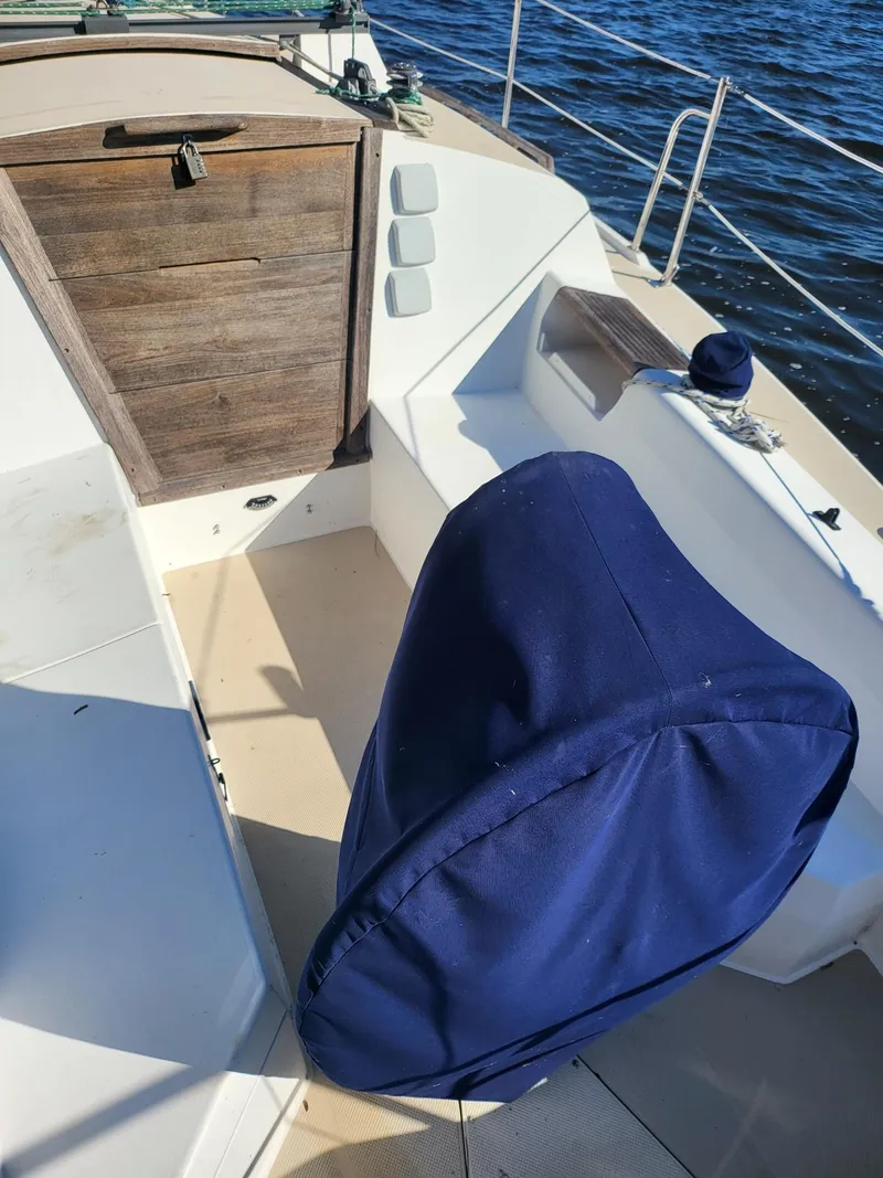 Slide: The Image of Cockpit of a 1988 Catalina 30 yacht with blue cover. - 22