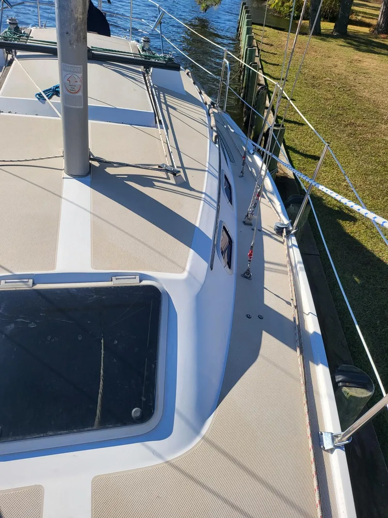 Slide: The Image of 1988 Catalina 30 sailboat at dock, deck view. - 31