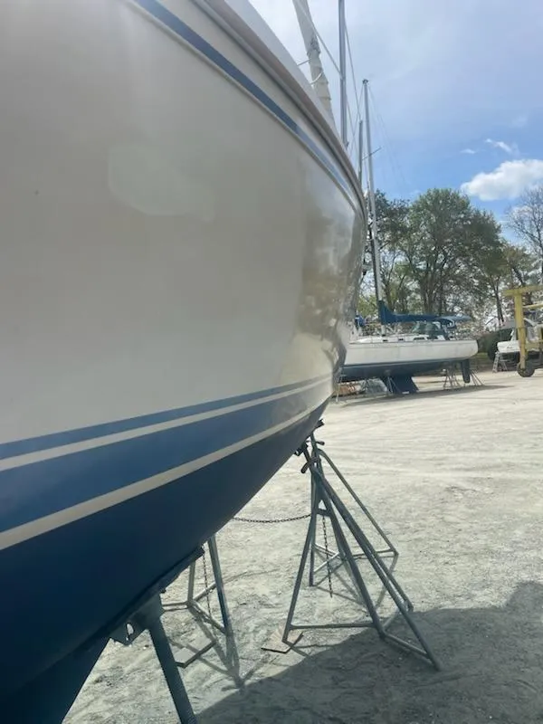 Slide: The Image of 1988 Catalina 30 sailboat on a dry dock. - 33