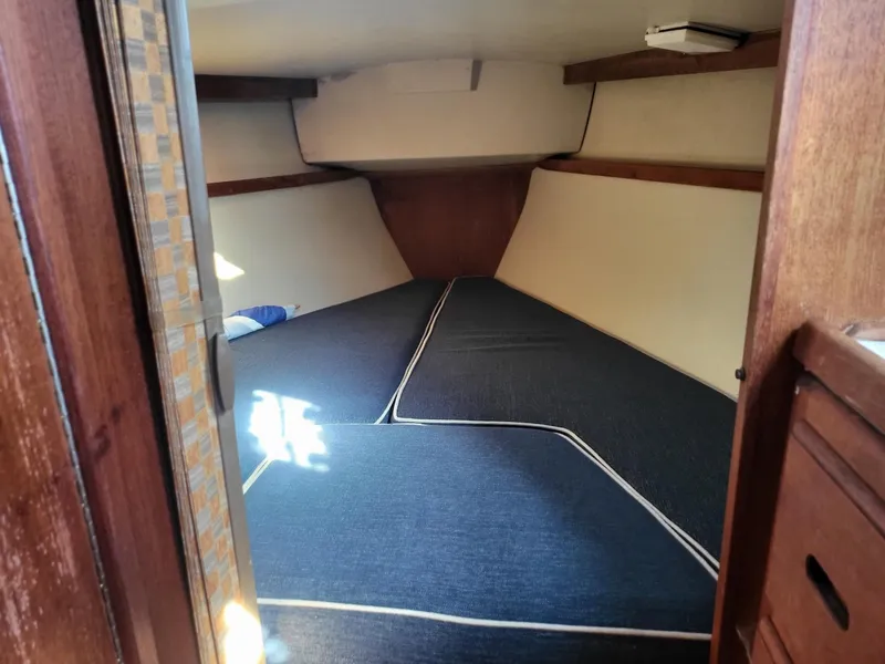 Slide: The Image of Interior of a 1988 Catalina 30 yacht with sleeping area. - 4