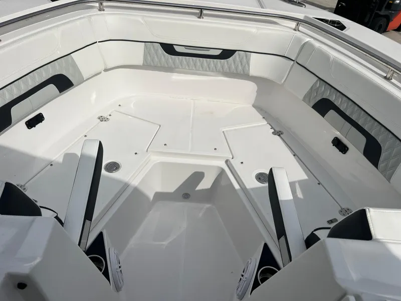 Slide: The Image of 2024 Blackfin 272 DC boat interior with spacious seating and modern design. - 22