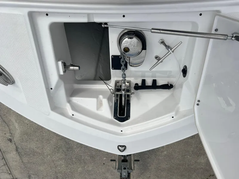 Slide: The Image of 2024 Blackfin 272 DC anchor compartment with chain and winch system. - 25