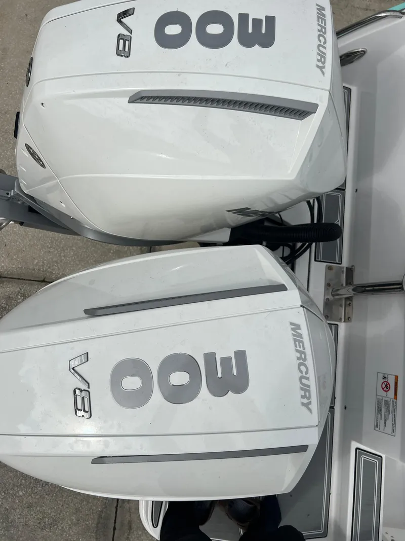 Slide: The Image of Twin Mercury 300 V8 engines on a 2024 Blackfin 272 DC boat. - 31
