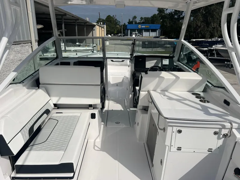 Slide: The Image of 2024 Blackfin 272 DC boat interior with seating and helm, showcasing modern design and functionality. - 40