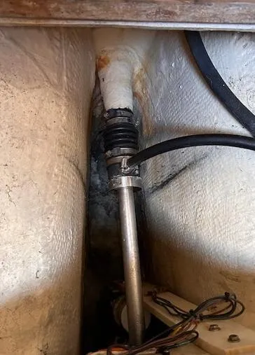 Slide: The Image of 1984 Whitby 42 Ketch interior showing mechanical components and wiring. - 35