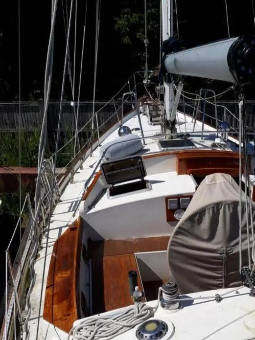 Slide: The Image of 1984 Whitby 42 Ketch sailboat deck with rigging and equipment. - 6
