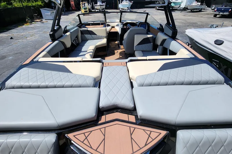 Slide: The Image of 2022 Tigé Z1 boat interior with luxurious seating and modern design. - 4