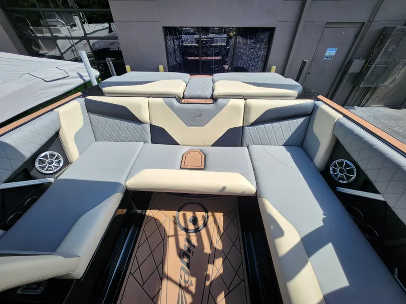 Slide: The Image of 2022 Tigé Z1 boat interior with luxurious seating and modern design. - 5