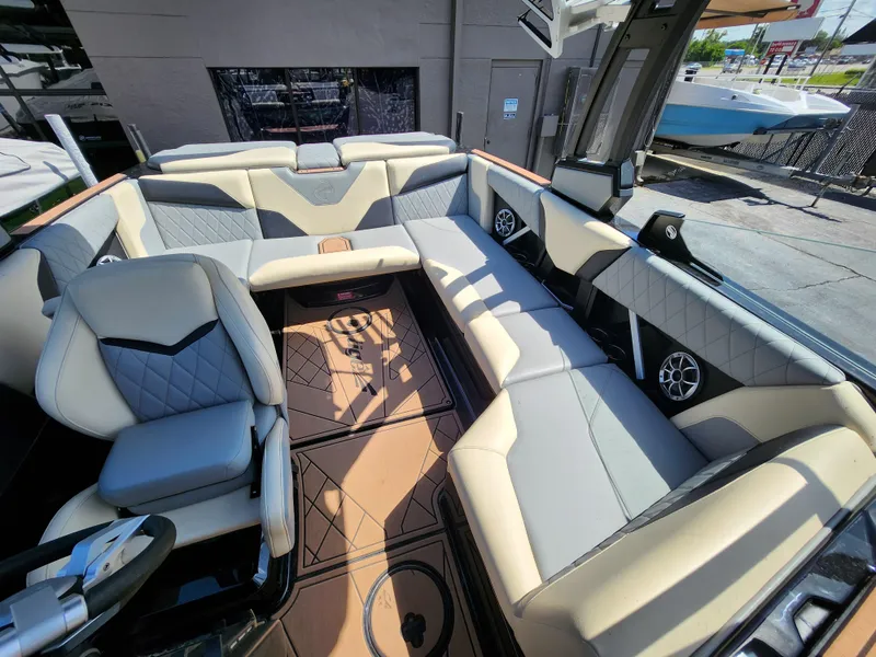 Slide: The Image of 2022 Tigé Z1 boat interior with luxurious seating and modern design. - 6
