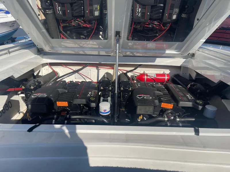 Slide: The Image of 1998 Formula 312FASTECH boat engine compartment with twin MerCruiser engines. - 22