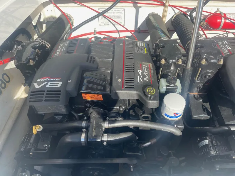 Slide: The Image of 1998 Formula 312FASTECH engine compartment with MerCruiser V8 engine. - 23