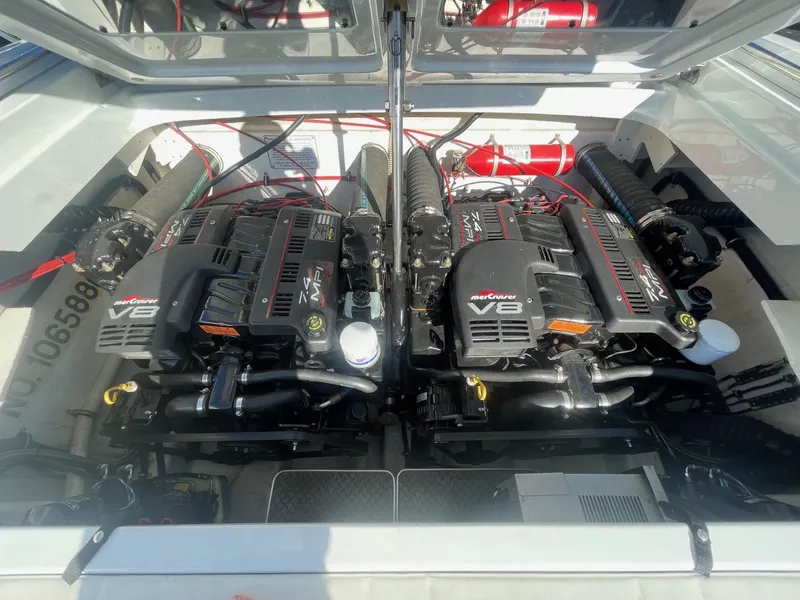 Slide: The Image of Twin V8 engines in a 1998 Formula 312FASTECH boat, showcasing powerful performance. - 27