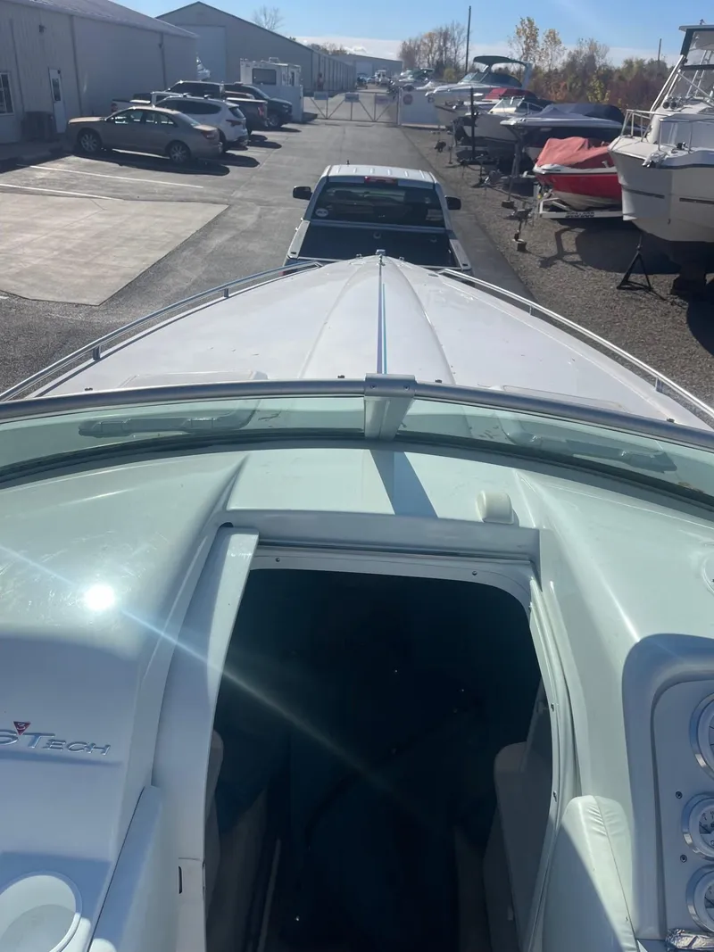 Slide: The Image of 1998 Formula 312FASTECH boat on trailer in storage yard. - 28