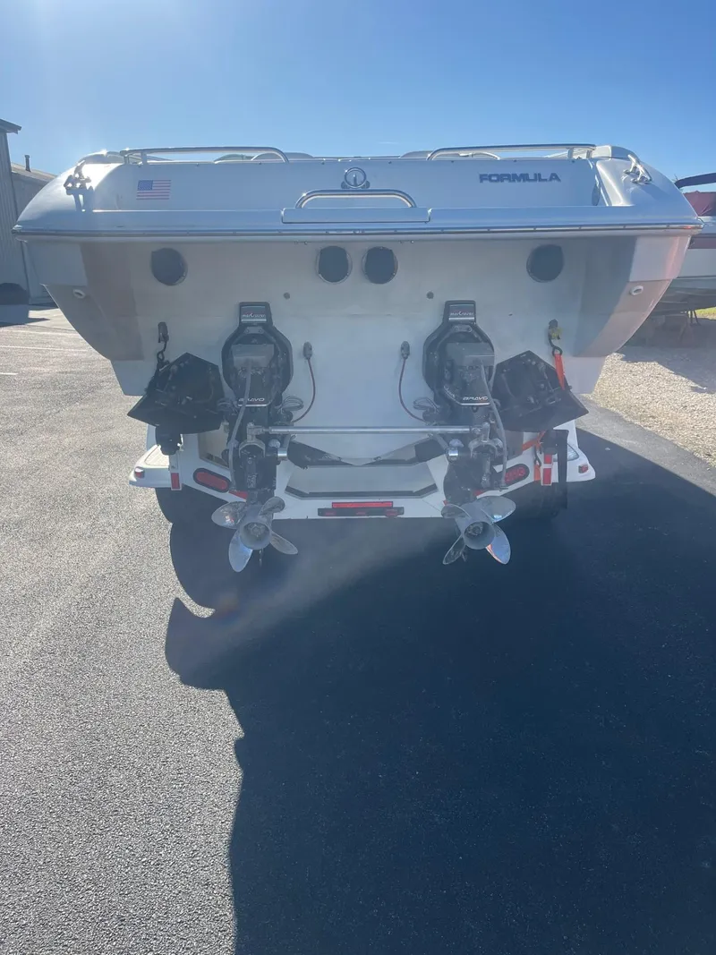 Slide: The Image of 1998 Formula 312FASTECH boat rear view with dual propellers. - 3