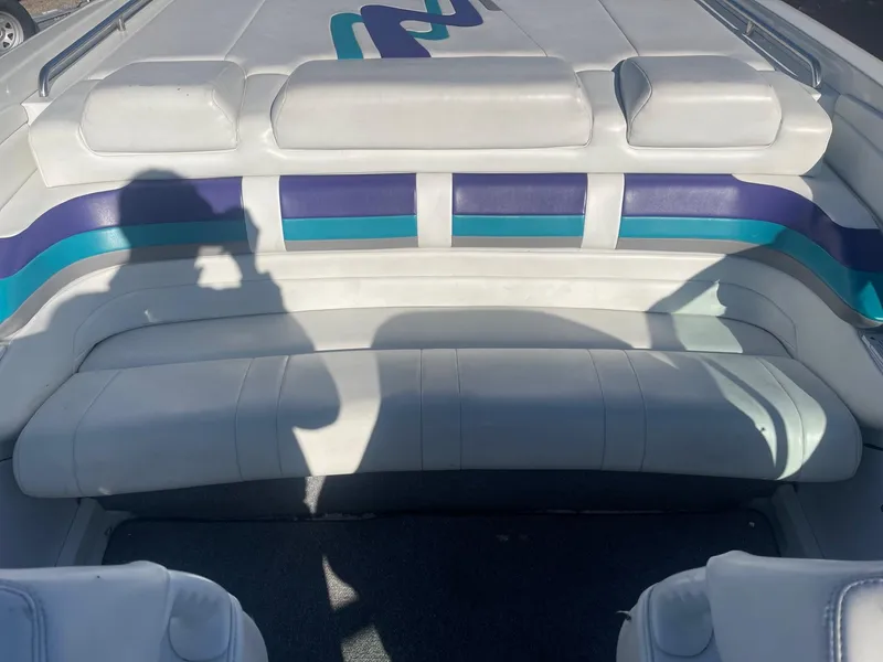 Slide: The Image of 1998 Formula 312FASTECH boat interior with white and blue seating. - 5
