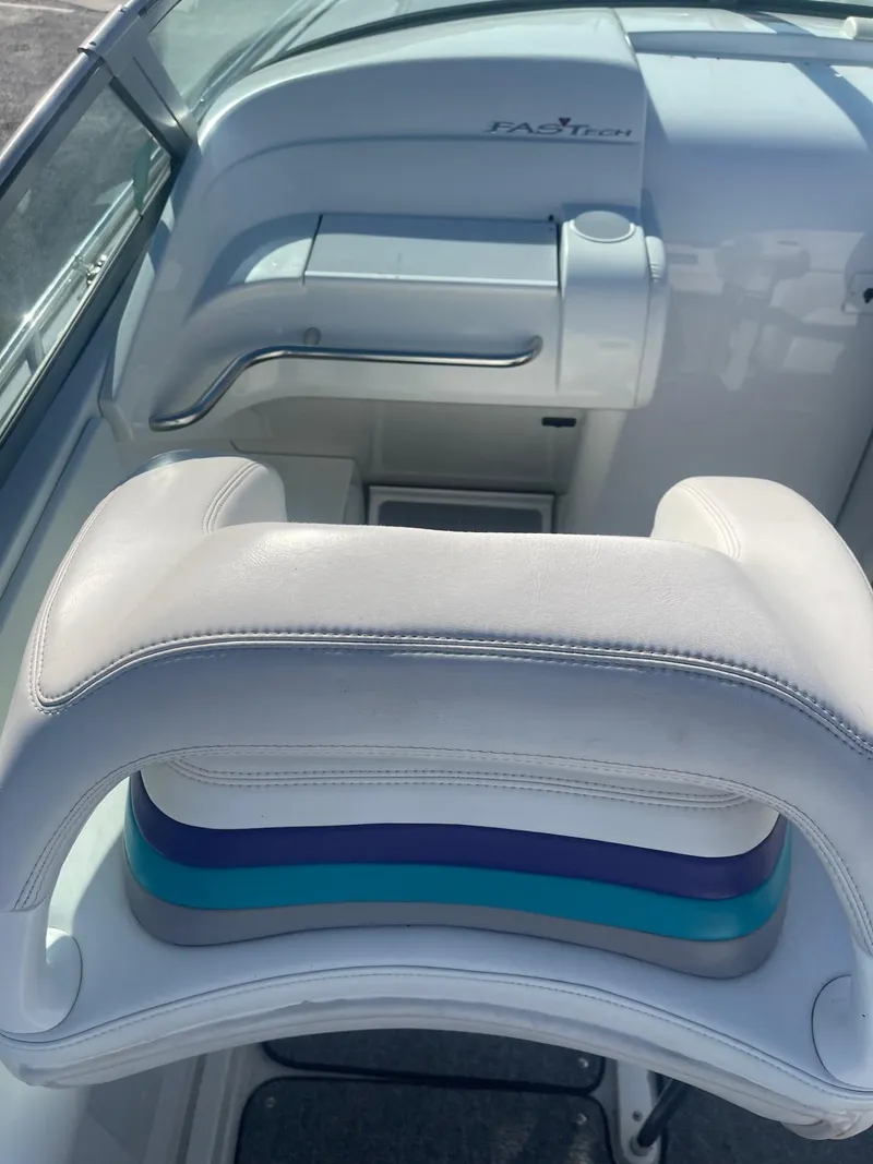 Slide: The Image of 1998 Formula 312FASTECH boat interior with white and blue seating. - 7
