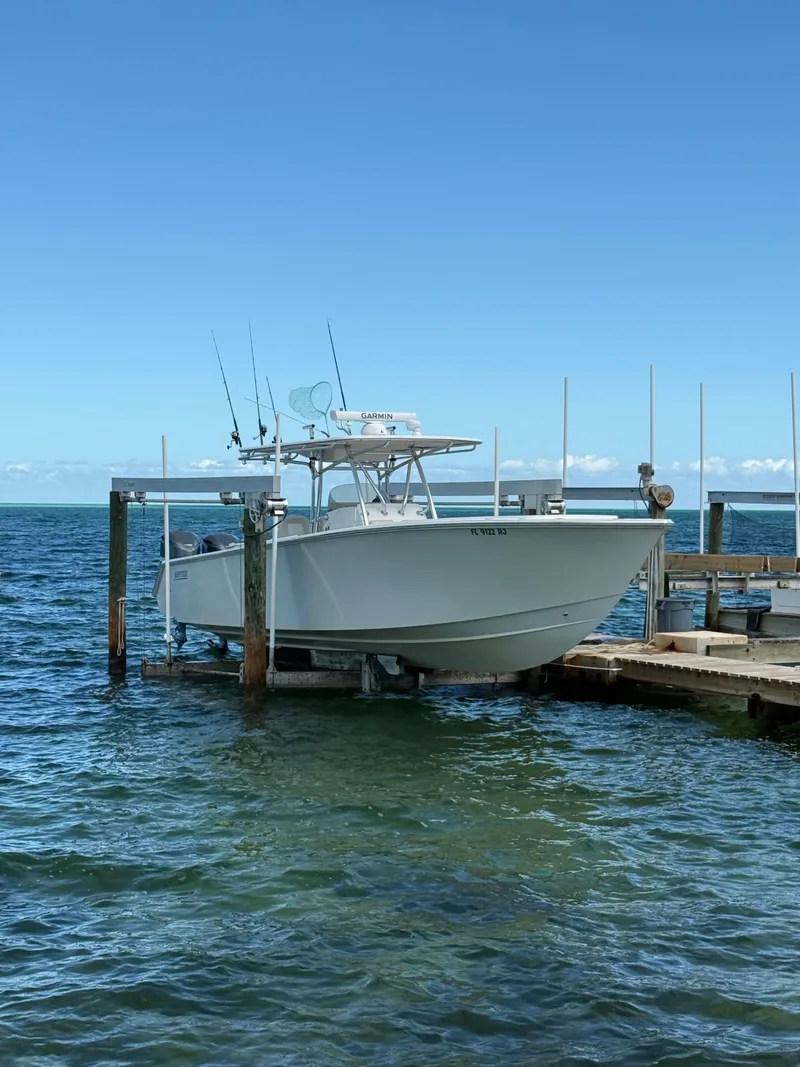 Slide: The Image of 2008 Jupiter 38 boat docked on a sunny day. - 1